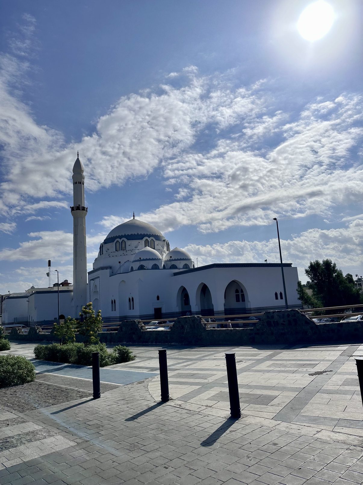 Masjid Quba in Madinah, white domes and minarets under a wide sky